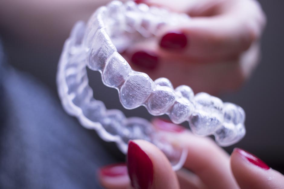 Invisible clear dental teeth aligner straighteners for orthodontic dentists treatment as modern aesthetic brackets.